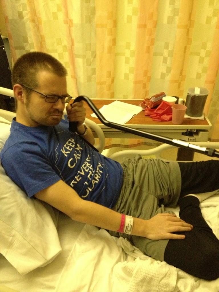 Stroke Bloke gives it some stick Stroke Bloke in his hospital bed. And leggings.